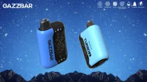 Two blue Gazzbar vape devices floating against a starry sky background with mountains at the bottom.